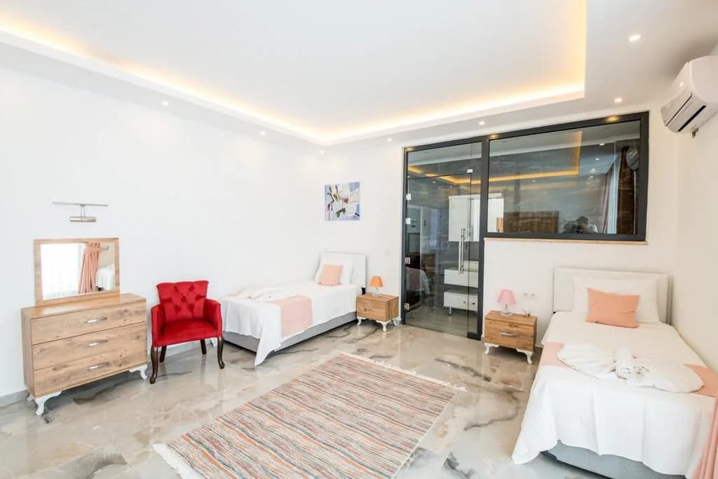 Kalkan Akbel'de deniz manzaralı, jakuzili ve korunaklı havuzlu Villa Twins 1